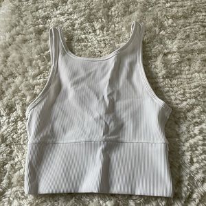 Never worn lululemon power pivot tank size 4